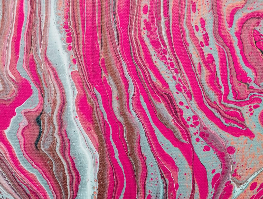 Scott Webb photo of abstract art. Shades of pink, red, gray and rust.