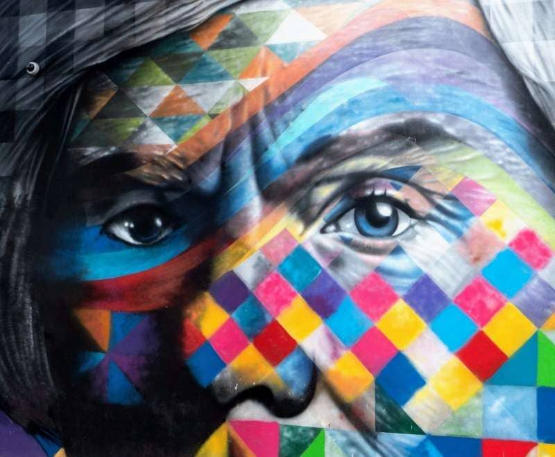 Andy Warhol's eyes in colorful street mural by Eduardo Kobra